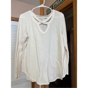 Beautiful cream colored long sleeve blouse from Maurice’s